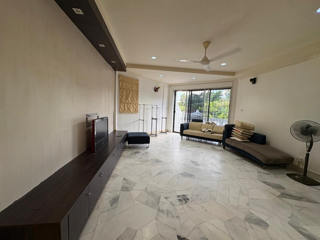 Spacious living room inside Colonnades Condominium