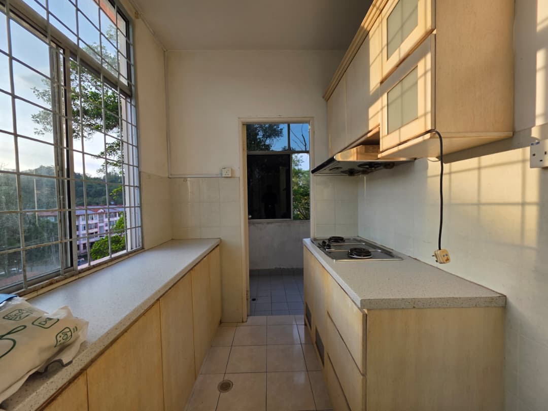 Kitchen inside Country Heights Apartment